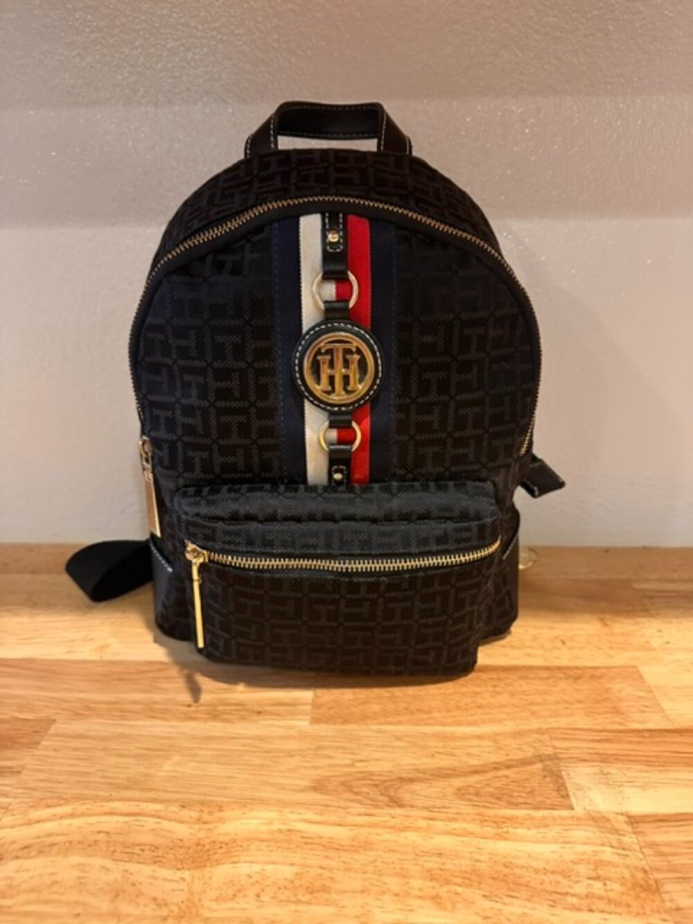 Tommy Hilfiger Small Monogram Black Jacquard Jaden Backpack w/ Gold Medallion
